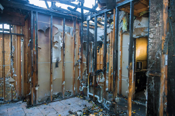 Professional Fire Damage Restoration technician working in Hollister, CA